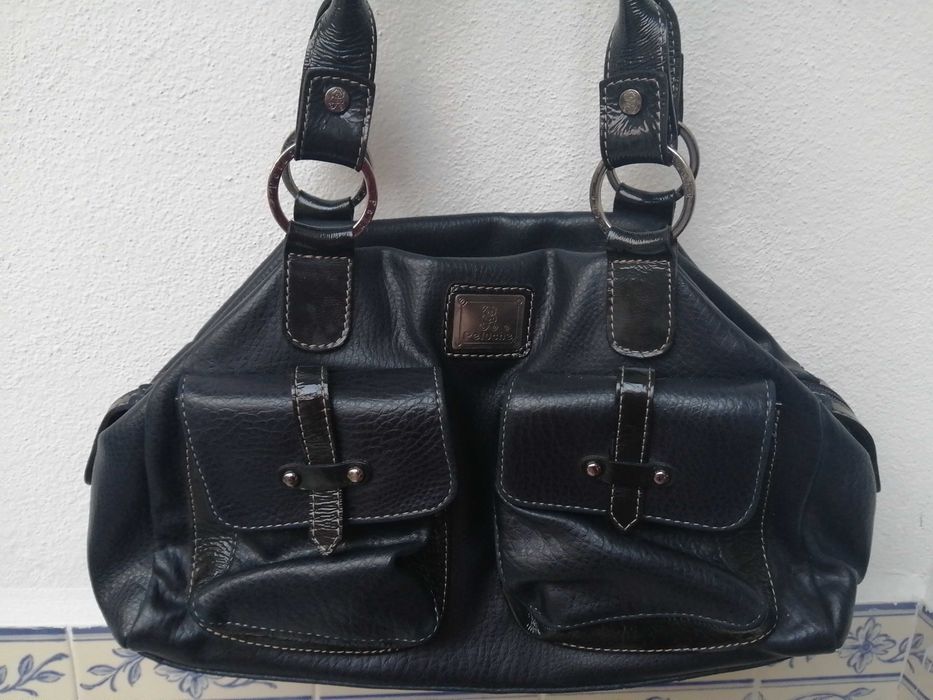 Mala em pele da peluche e estojo de pedicure para tratar dos pés