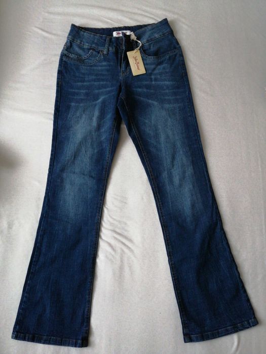 Nowe spodnie jeansowe dzwony 38 M