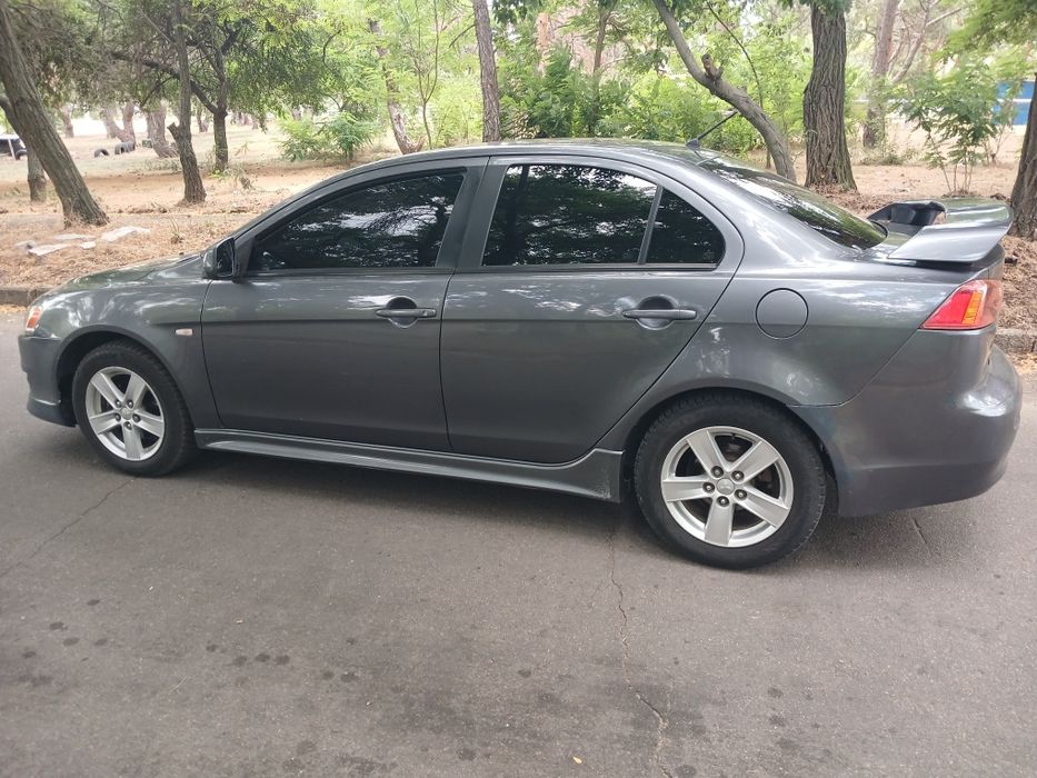 Продам lancer 2.0 акпп газ /бензин
