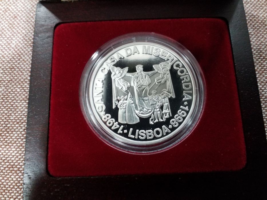 Moedas antigas em prata portuguesas.