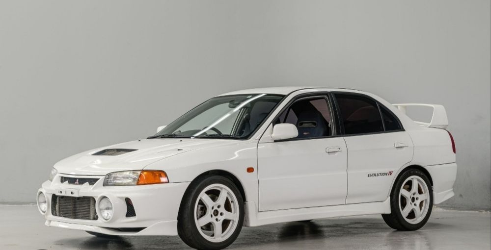 Lancer evo 4 forras de porta