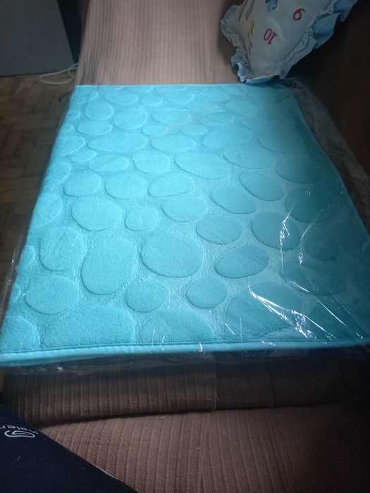 Blue-toned rug still in original packaging