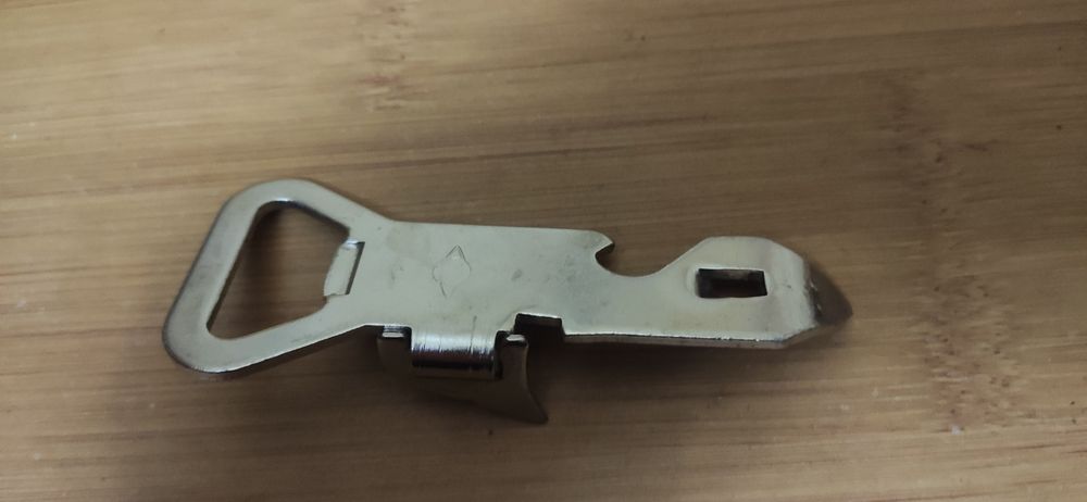 Консервний ключ, відкривачка