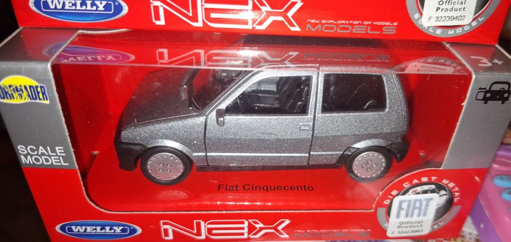Fiat Cinquecento model Welly 1:34, metalowe autko, otwierane drzwi