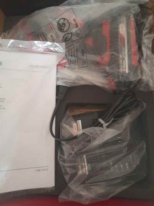 Máquina nova em caixa