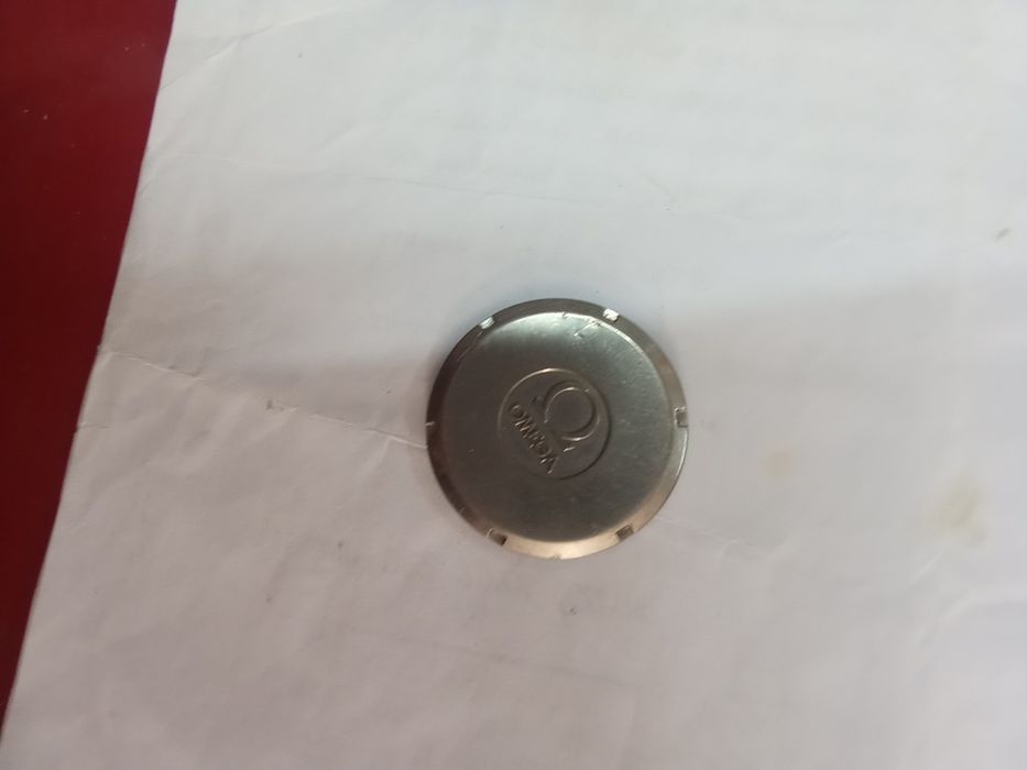 Uma caixa aço Omega. Duas tampas. Uma Sicura