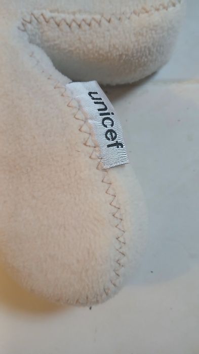 Peluche simples urso Unicef.