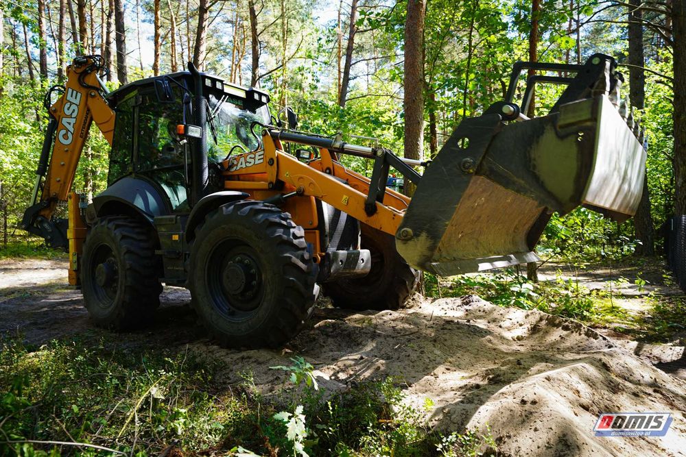 KOPARKA koparko-ładowarka zimia kruszywo Prace ziemne