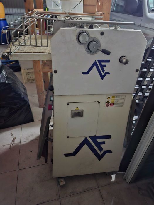 Enroladora de baguetes e pão