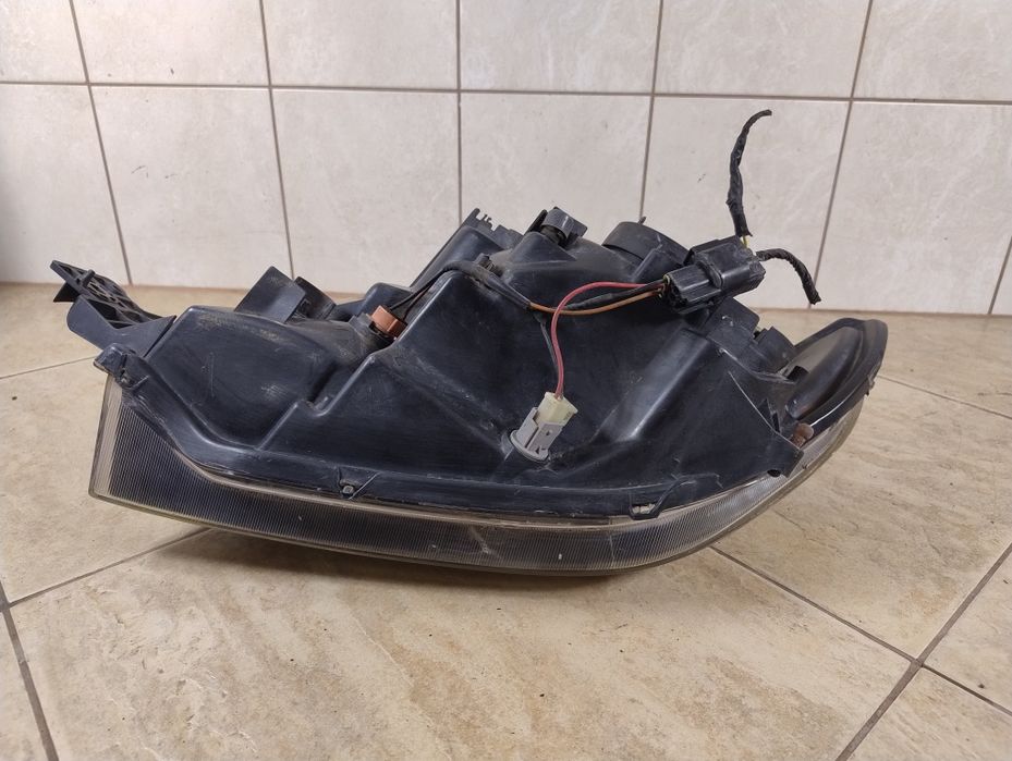 Mitsubishi Outlander I 1 lampa prawy przód Europa reflektor wysyłka