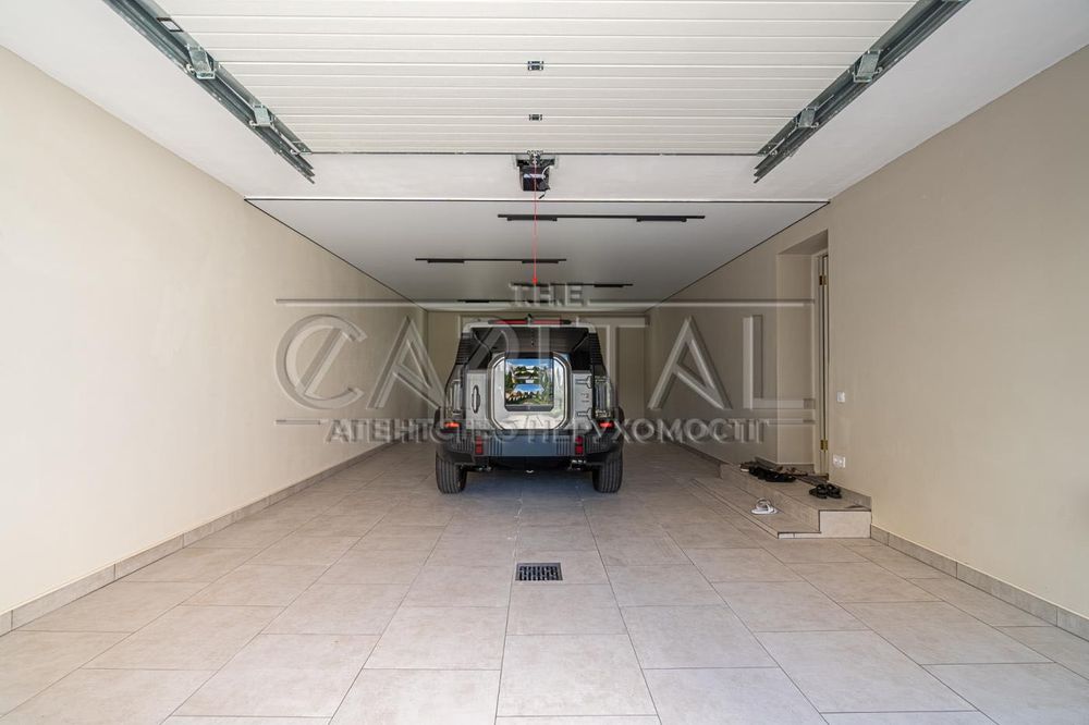 Оренда простoрого та елегантного будинку площею 753 кв м у Крюківщині