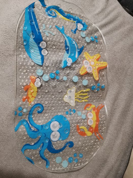 Антиковзаючий килимок у ванну