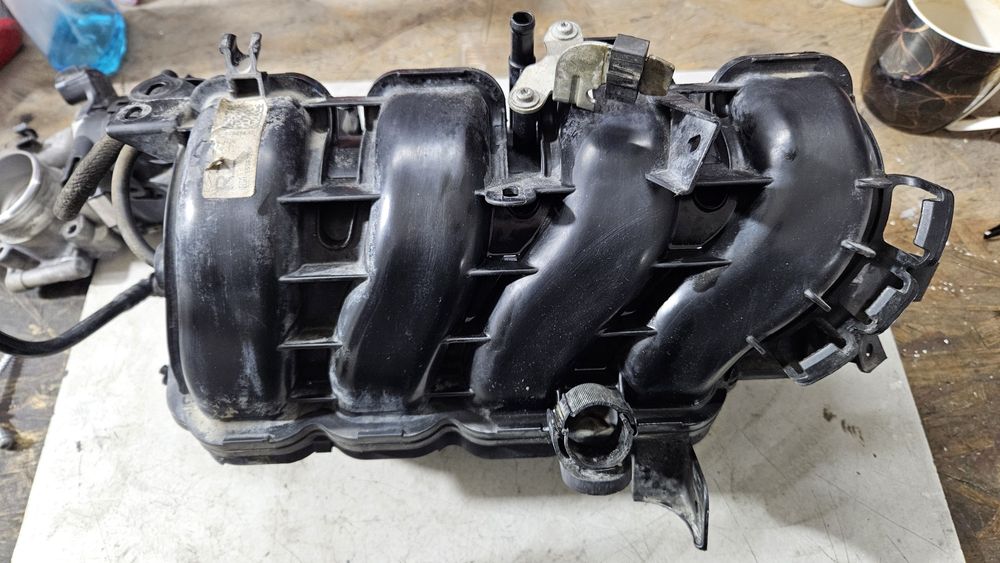 Kolektor ssący klapy wirowe opel corsa d 1.2 1.4 a14xer a12xer