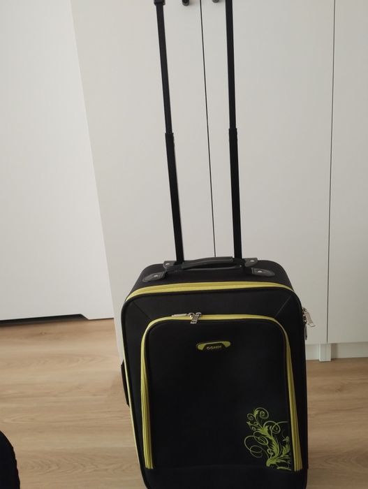 Walizkę z rączką na kółkach  marki Conin