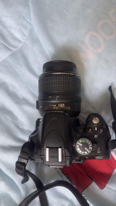 Nikon D5100 + 18–55mm VR + Battery Grip + Kit Completo