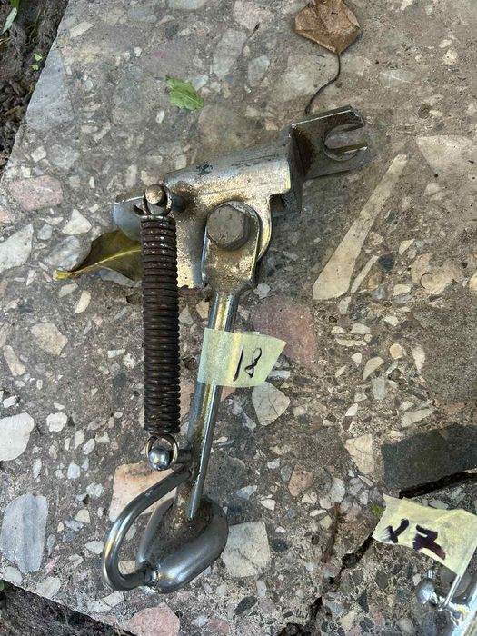 Бокова ножка Honda dio 18-25  34-35-ZX