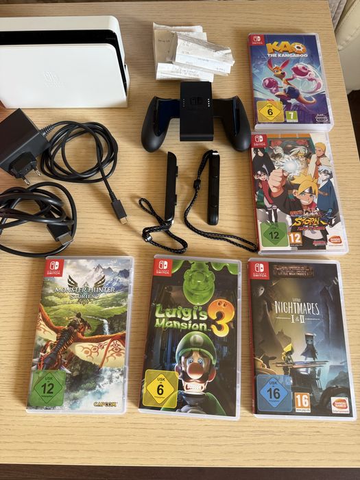 Nintendo Switch Oled, 2 gry, karta 256 GB, pokrowiec