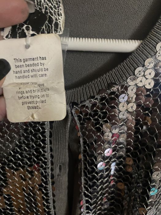 Casaco malha e lantejoulas