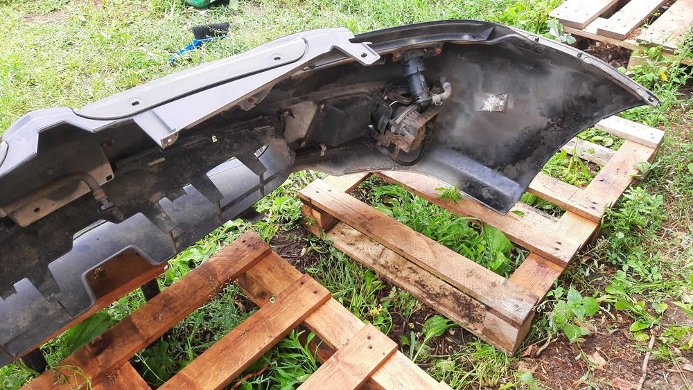 Mitsubishi Lancer VII 7 zderzak przedni kompletny spryski halogeny