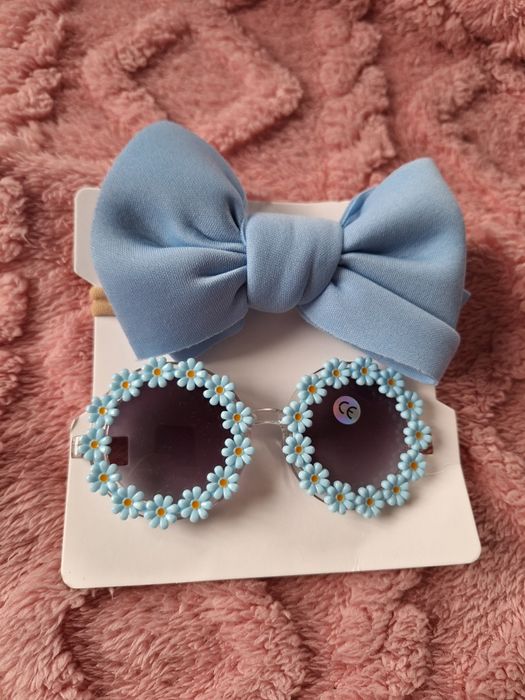 Nowe niebieskie dziecięce okulary przeciwsłoneczne dla dziecka dziewcz