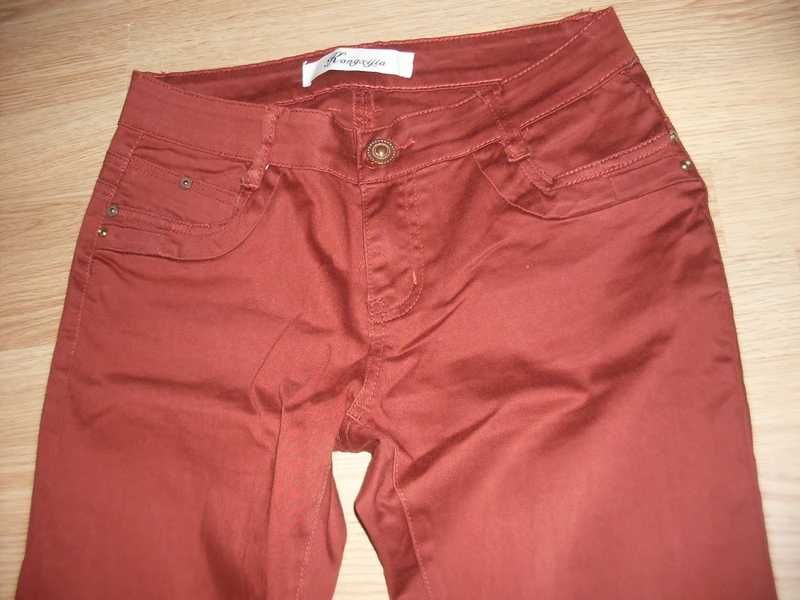 spodnie rude rurki biodrówki 38