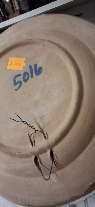 Talerz ozdobny do powieszenia na ścianie z motywem ptaszka