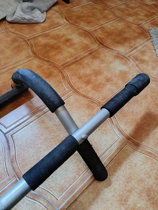 Barra de elevação para porta