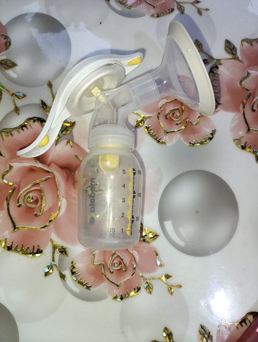 Механический молокоотсос