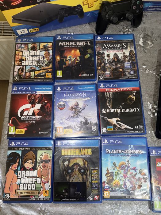 Продам Sony PlayStation 4 Slim 1TB+12дисків+2 геймпада