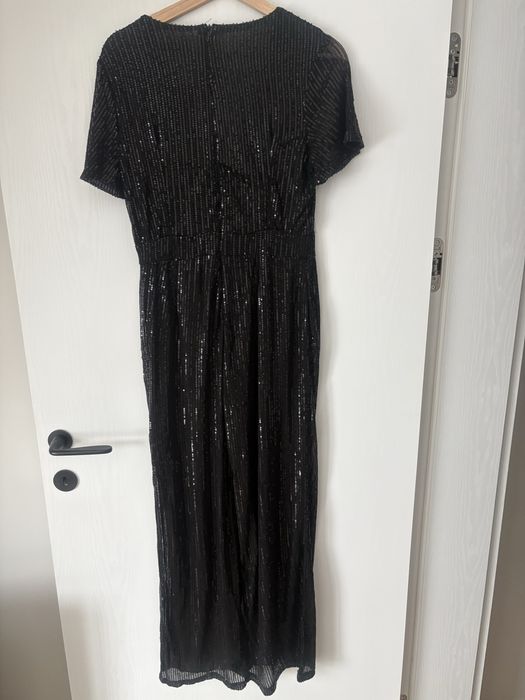 Piękny cekinowy czarny kombinezon M/L