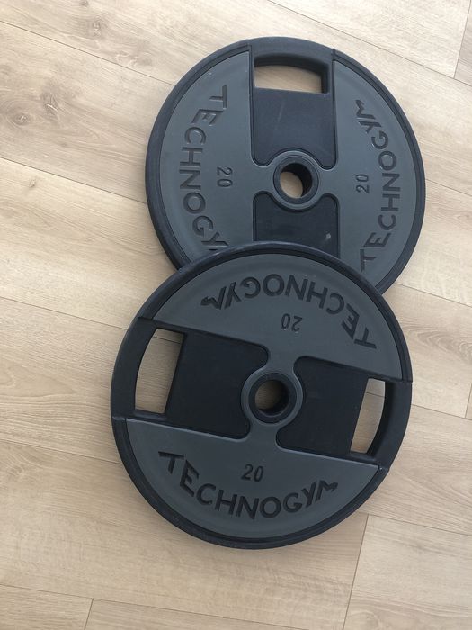 Talerze uretanowe Technogym 2x20kg - jak nowe! Obciażenie do sztangi gryfu