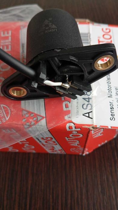 Датчик рівня оливи