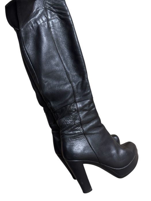 Шкіряні ботфорди на підборах