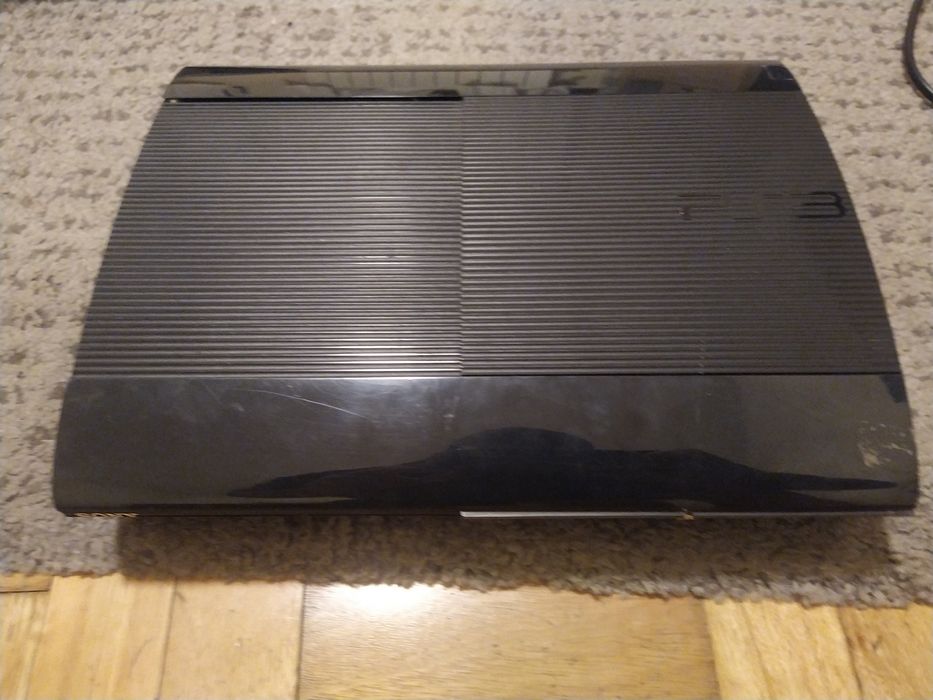 PS3 Super Slim 500 GB + Comando + Jogos