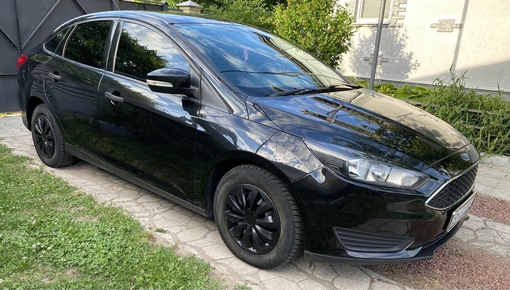 Ford Focus 2015 VIN 1FADP3E20FL265460 фото оголошення 4 з 23