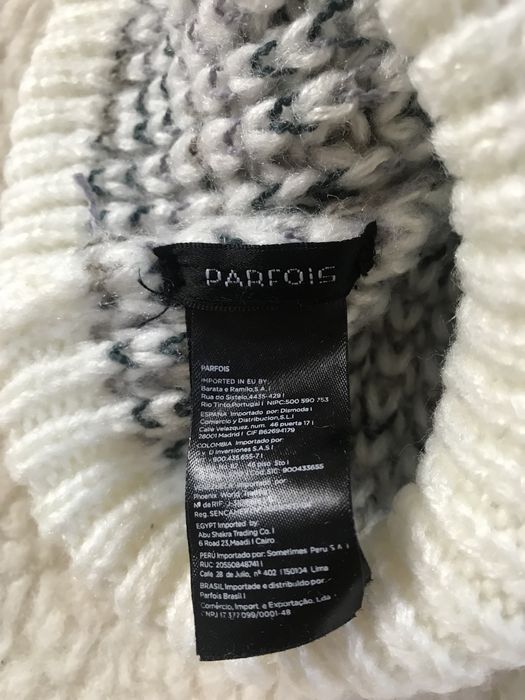 Biała czapka z pomponem, skandynawski wzór, kolorowy splot Parfois