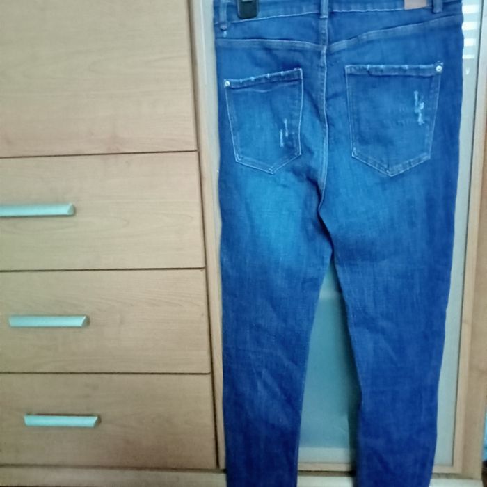 Jeansy damskie ze streczem i przetarciami Zara 40