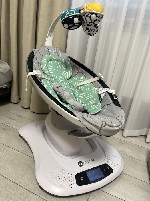 Заколисуючий центр 4moms