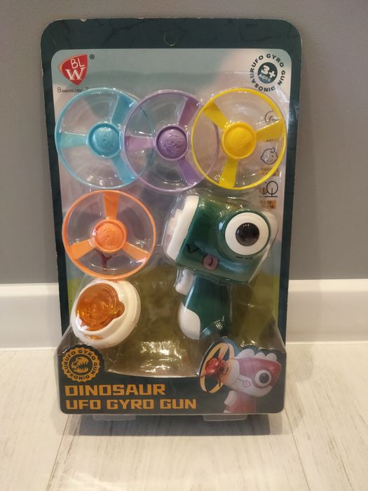 Wiatrak wiatraczek dinozaur pistolet zabawka  dla dzieci