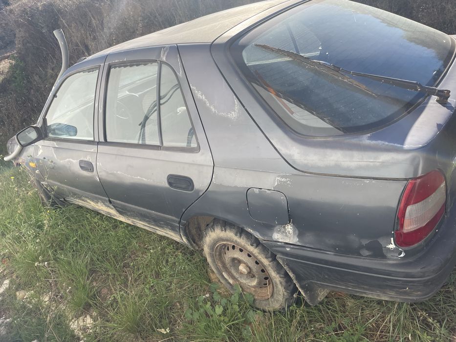 Nissan sunny 1,4 slx 80cv — photo 3