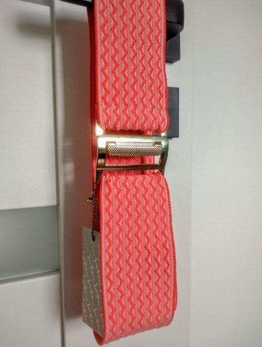 Pasek regulowany pomarańczowy pozłacany. Uniwersalny rozmiar.