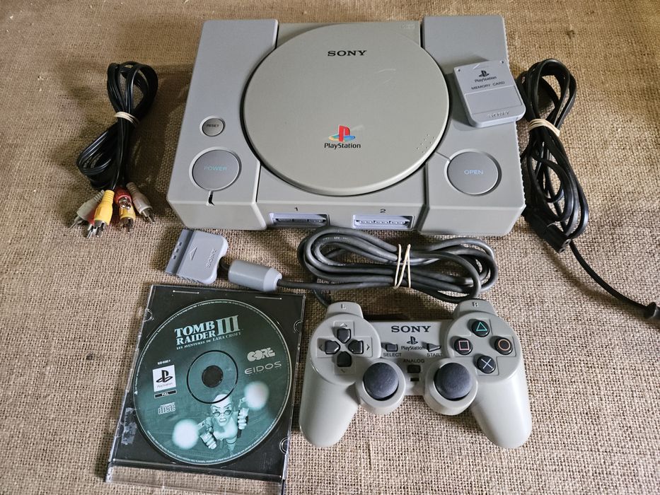 Consola ps1  com um jogo