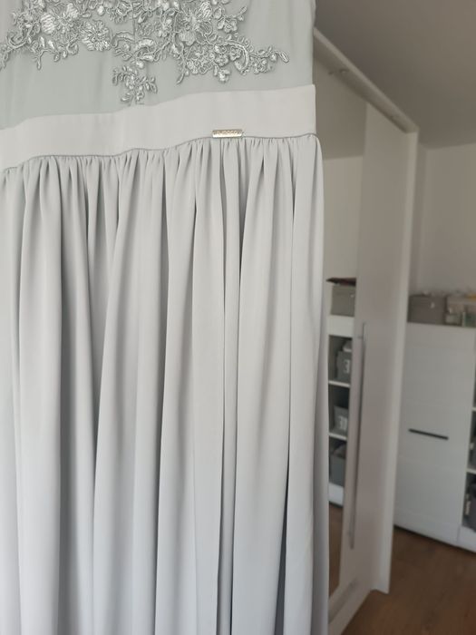 Długa sukienka weselna