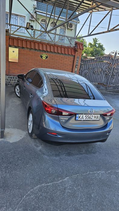 Мазда 3 2015 рік