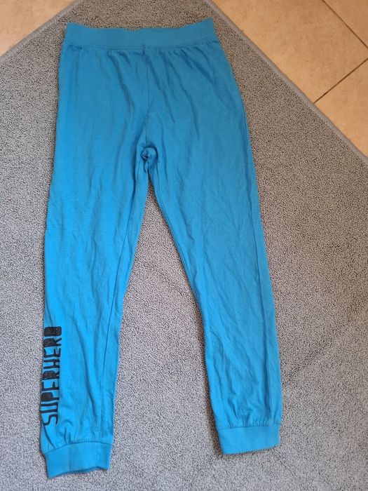 Nowe niebieskie spodnie legginsy chłopięce 122/128