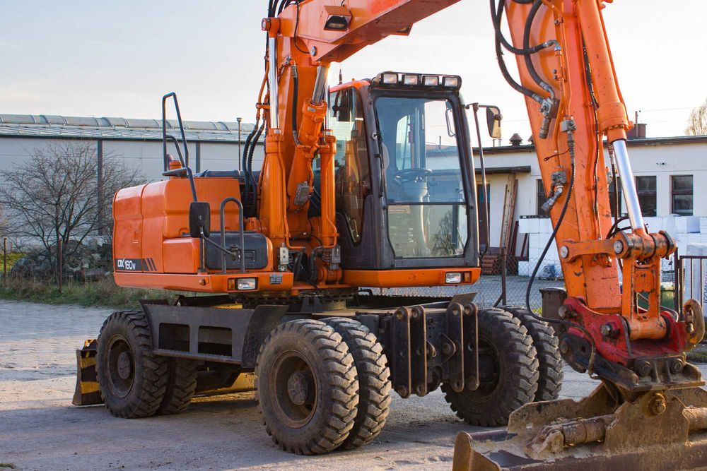 Odśnieżanie Koparko-ładowarka 4ośka