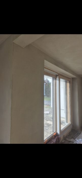 Tynki maszynowe cementowo wapienne