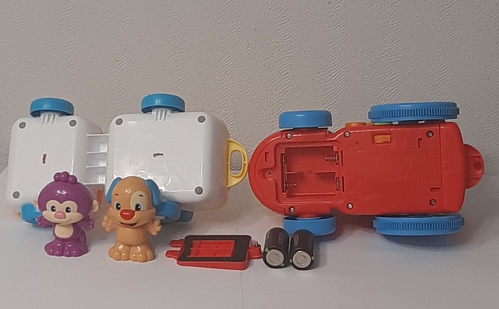 Развивающая игрушка "Поезд умного щенка" от бренда  Fisher Price