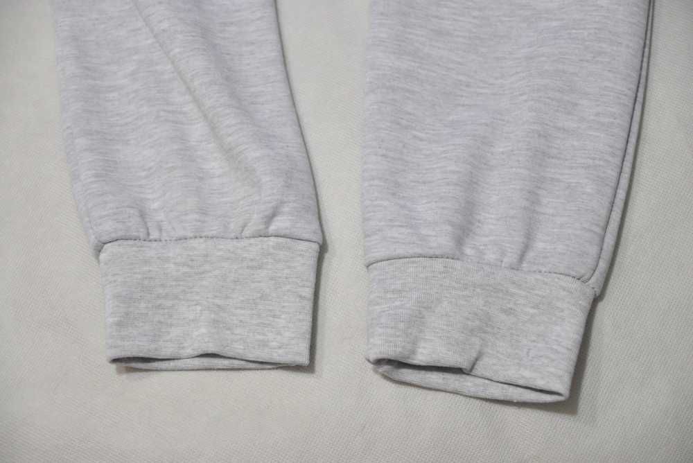 Nike L bawełniane męskie spodnie dresowe joggery