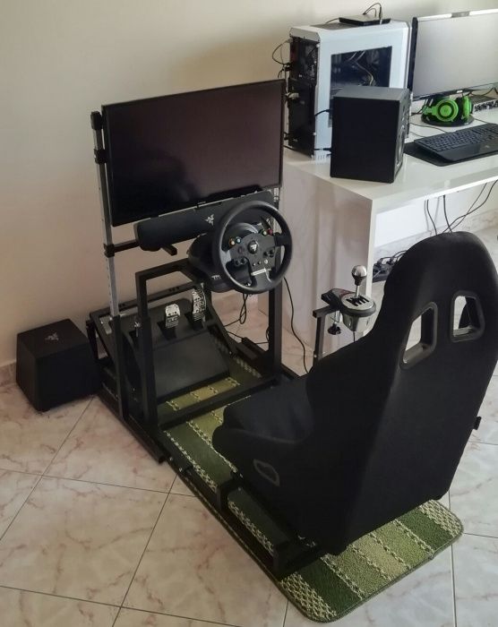 Cockpit simulator frame with fixed bucket seat and rails64563923342978121